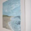 Schilderij - Minimalistisch strand met een detail